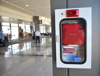 Close up of an AED in a commercial building