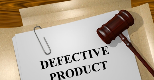 case file that says "Defective Product" with judge gavel on top