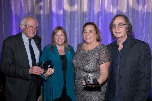 Chris Spagnoli with Bernie and Jane Sanders and musician Jackson Browne.